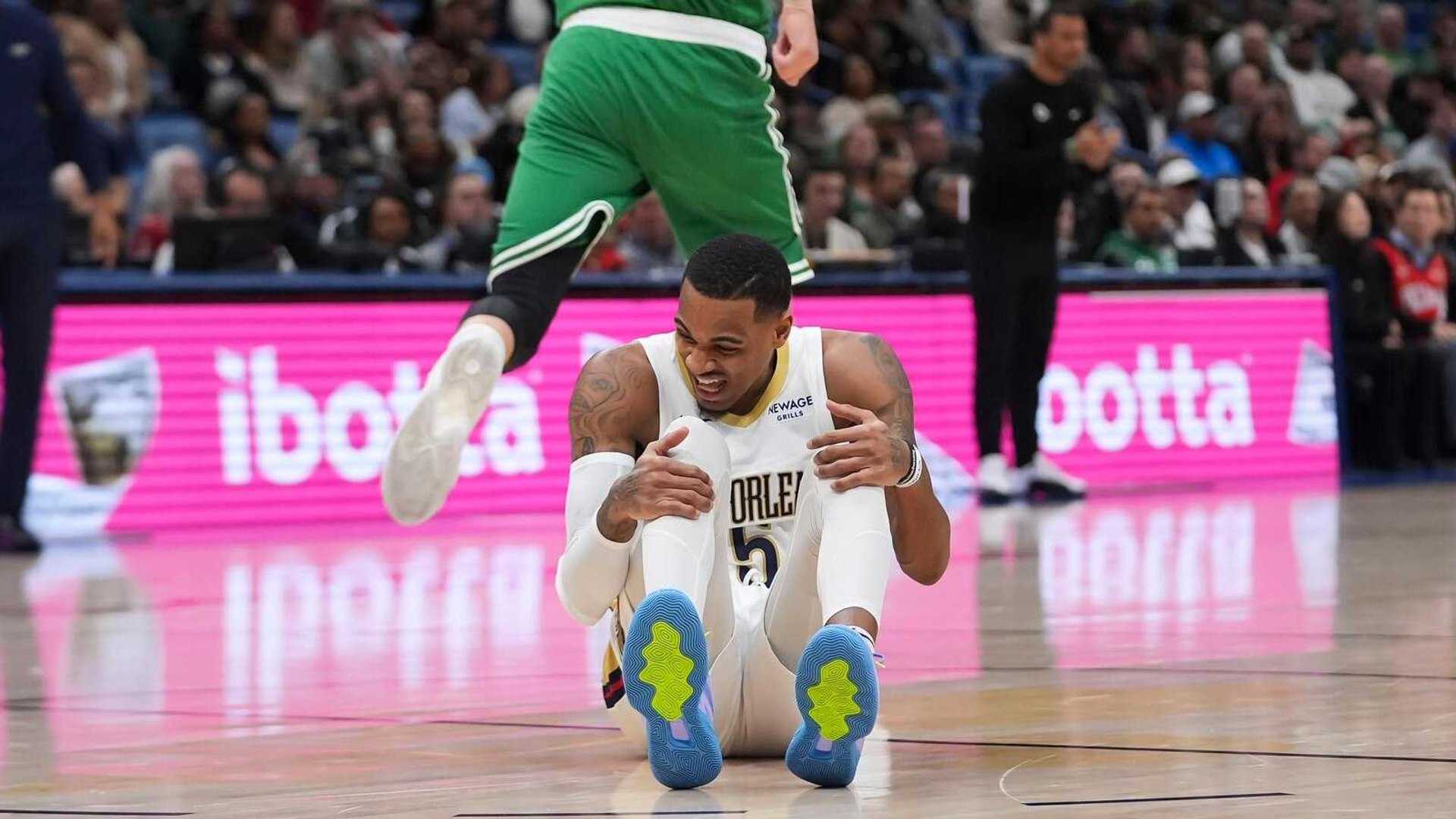 Dejounte Murray's Early Exit Raises Concerns for Pelicans Against Celtics