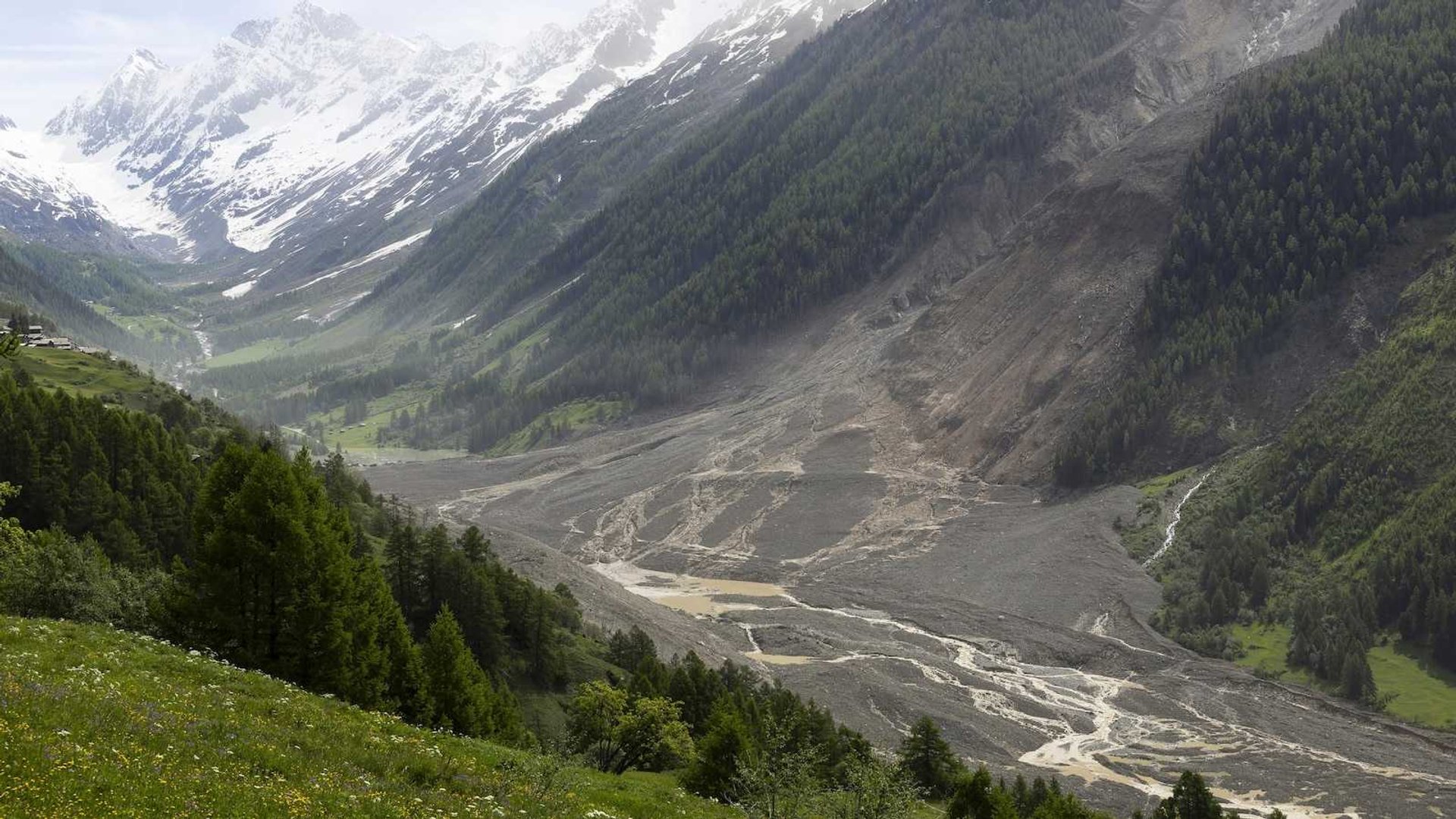 Alpine Crisis: Swiss Landslide Triggers River Disaster and Evacuations