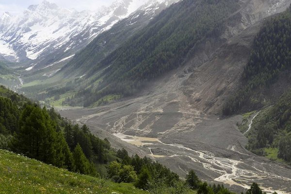Alpine Crisis: Swiss Landslide Triggers River Disaster and Evacuations