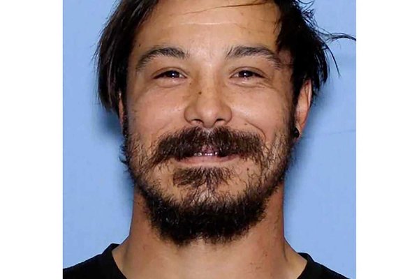Hunt Intensifies for Washington Father in Triple Homicide Case