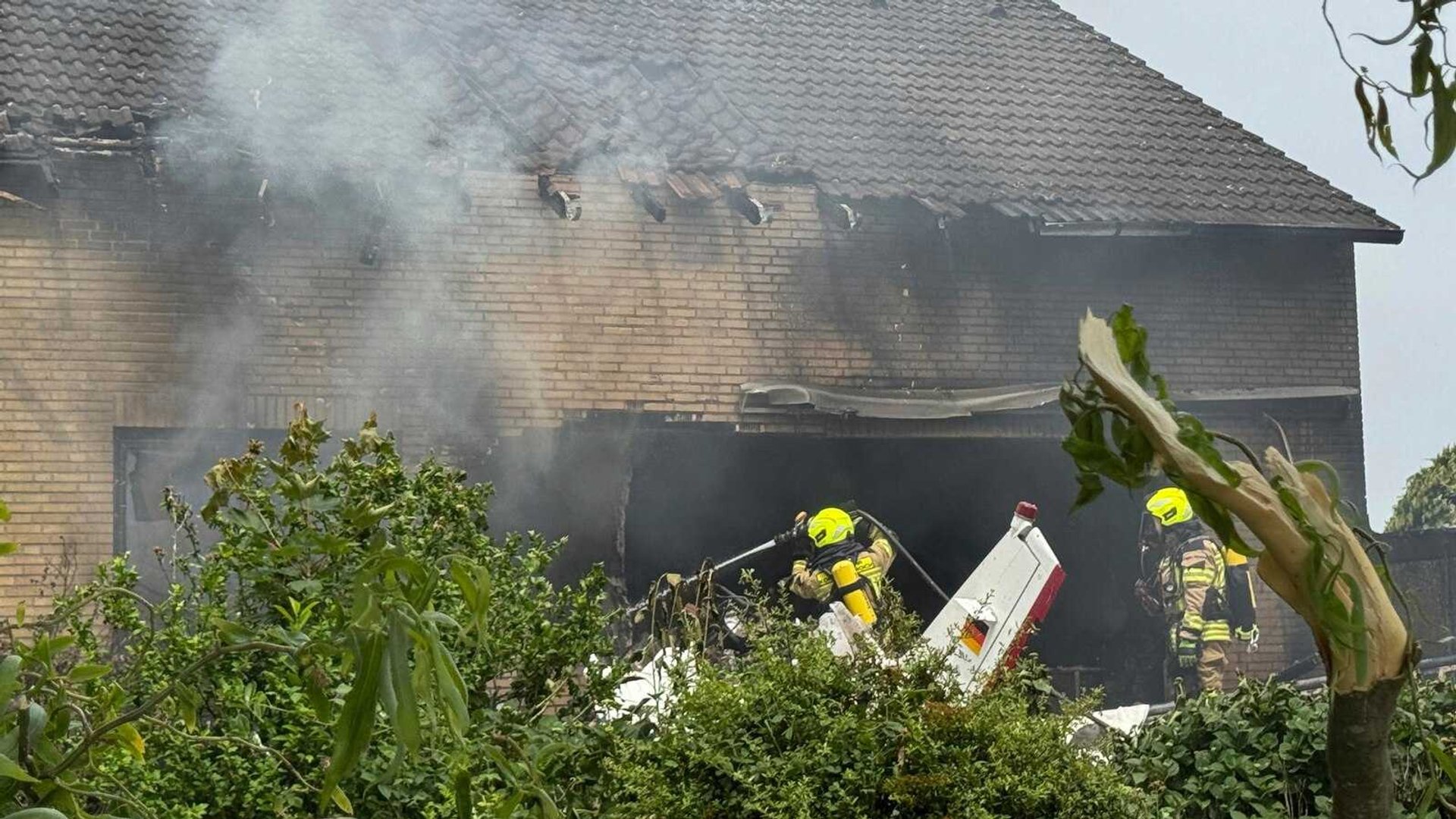 Fatal Plane Crash Rocks German Neighborhood: 2 Dead in Terrace Impact