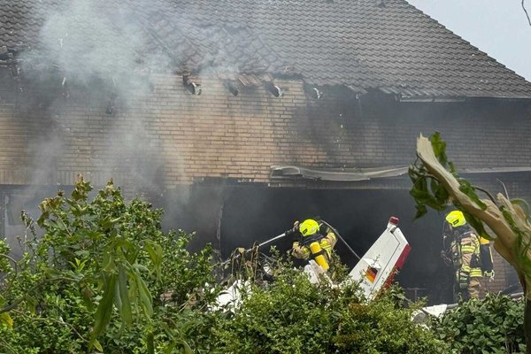 Fatal Plane Crash Rocks German Neighborhood: 2 Dead in Terrace Impact