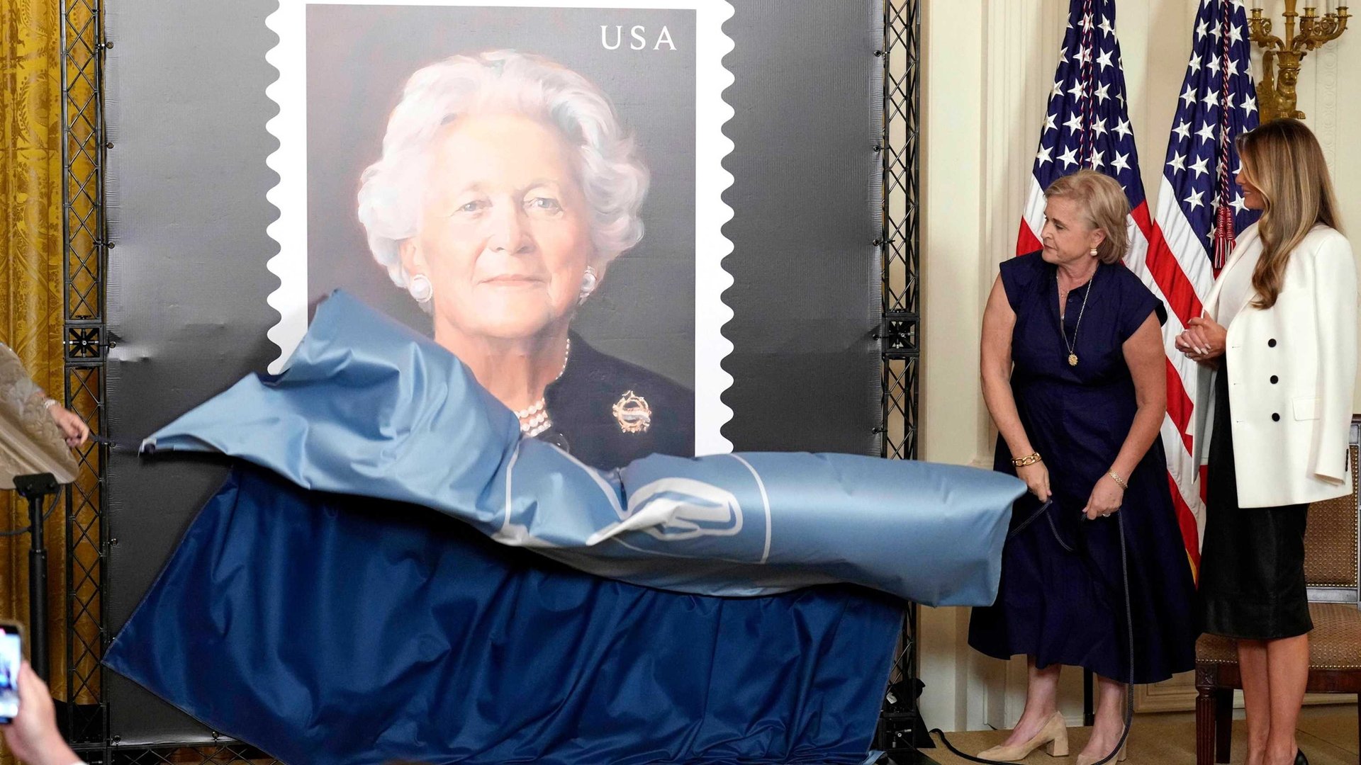 Melania Trump Unveils Barbara Bush Stamp Amid George W. Bush Absence
