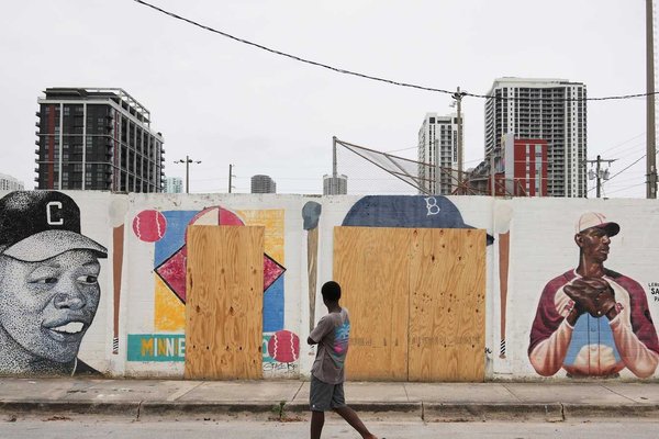 Miami Mural Vandalism: Jackie Robinson Tribute Defaced with Racist Symbols